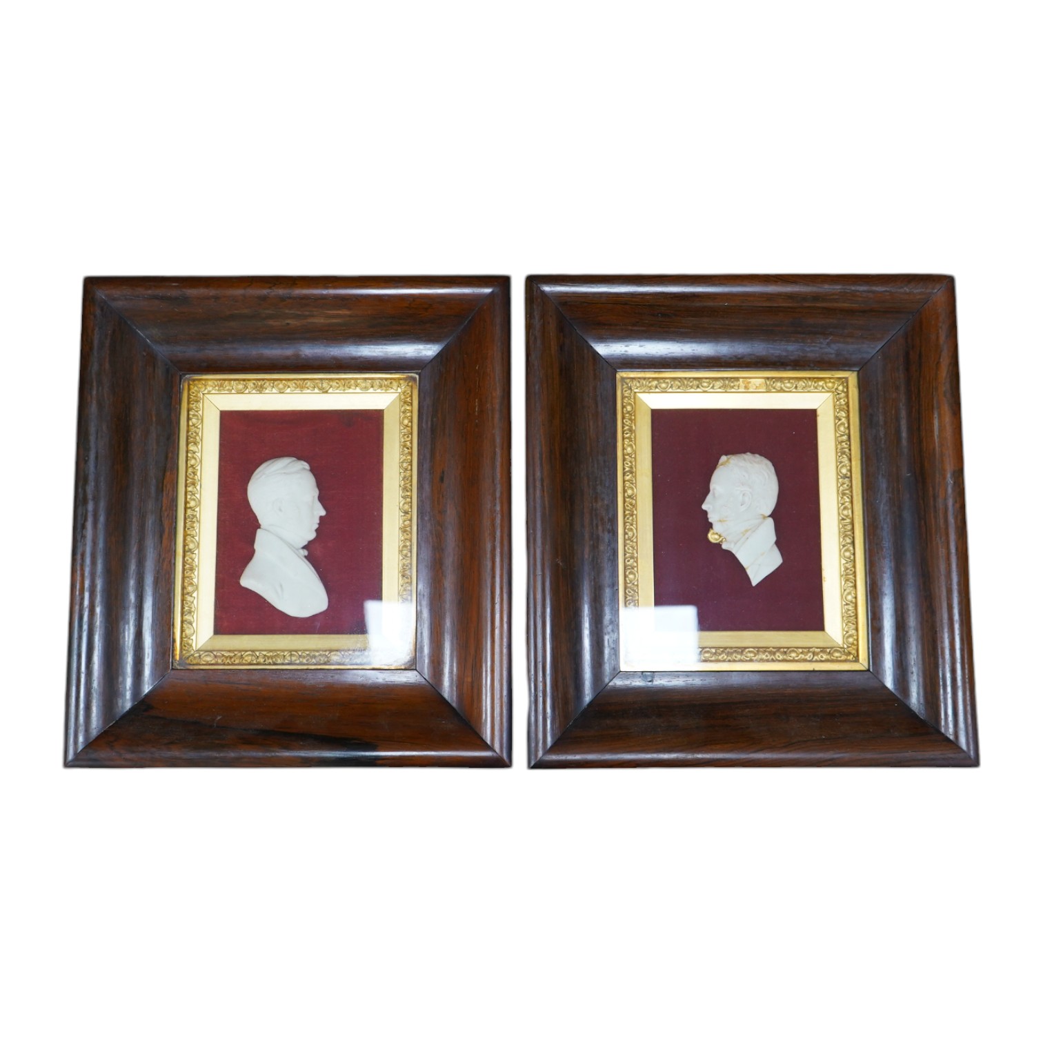 A pair of Victorian rosewood framed wax portraits of Dr. John Dick, 9cm wide, 12cm high. Condition - good